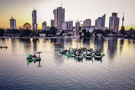 Floating islands on the old Danube at the first Floating Concert with Vienna skyline in the background