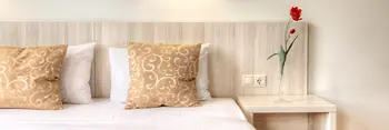 Bed in a hotel room